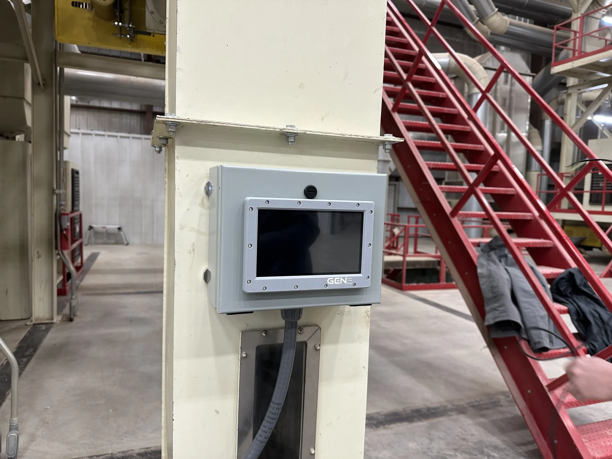 A Gen 3 touchscreen and enclosure installed in a working gin