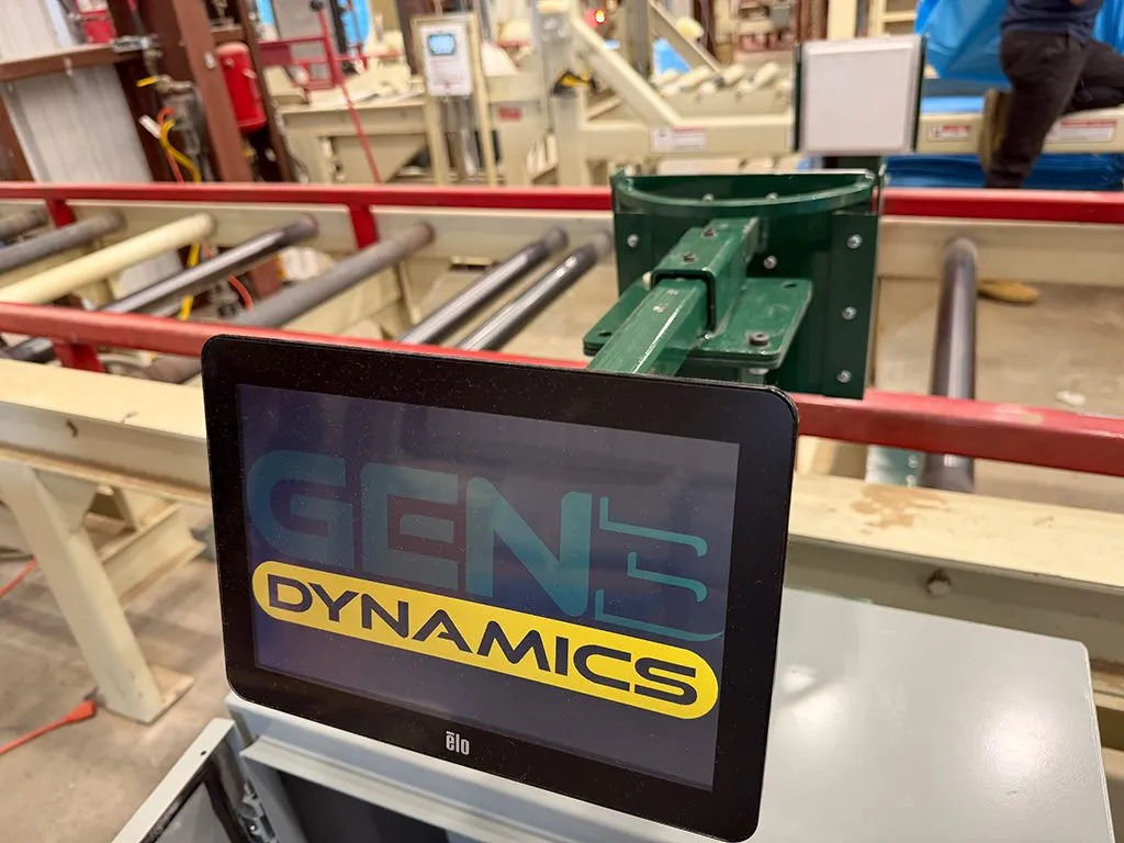 A Gen 3 Dynamics touchscreen on a stand beside the bale line sensor head